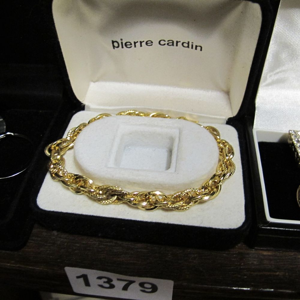 Lot 1379: A Pierre Cardin Gold-Tone Rope Twist Bracelet