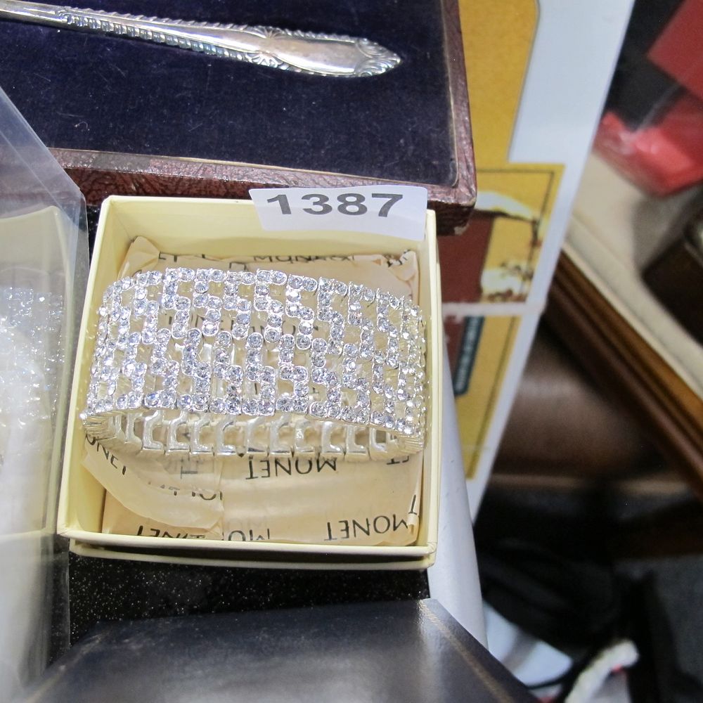 Lot 1387: A Monet silver-tone and clear crystal-set wide multi-row...