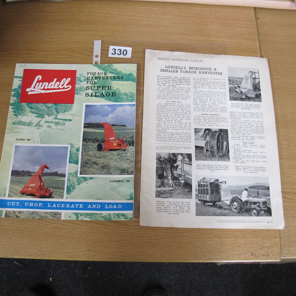 Lot 330: A Pair of Vintage Lundell Forage Harvester Sales...