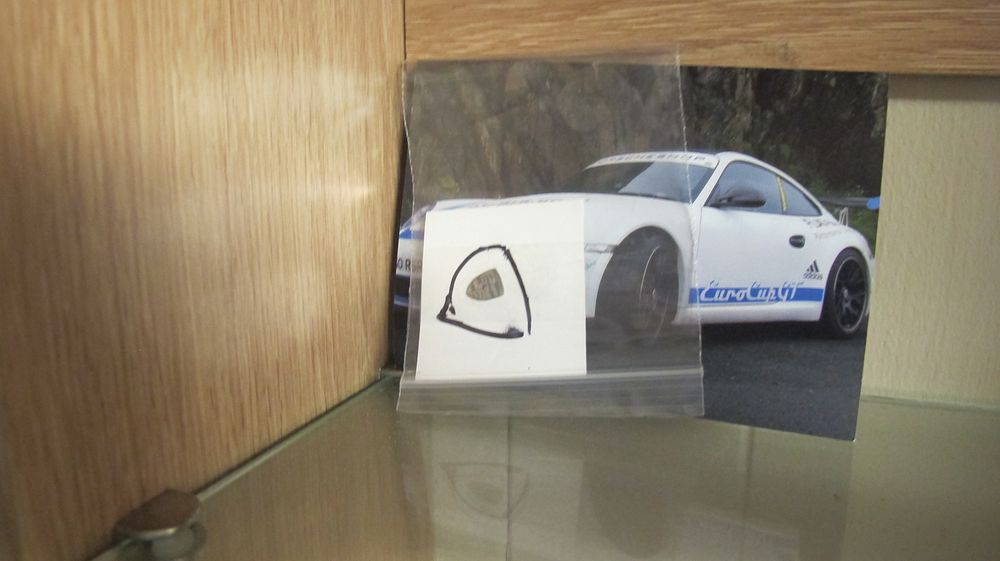 Lot 2: A Racing Fragment and Photograph of a Porsche 911 GT3 RSR