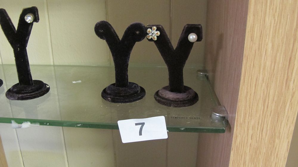 Lot 7: A Trio of Assorted Single Stud Earrings