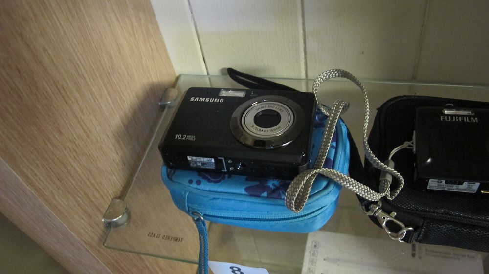 Lot 8: Two Compact Digital Cameras, Comprising Samsung ES55 and Fujifilm Models with Cases