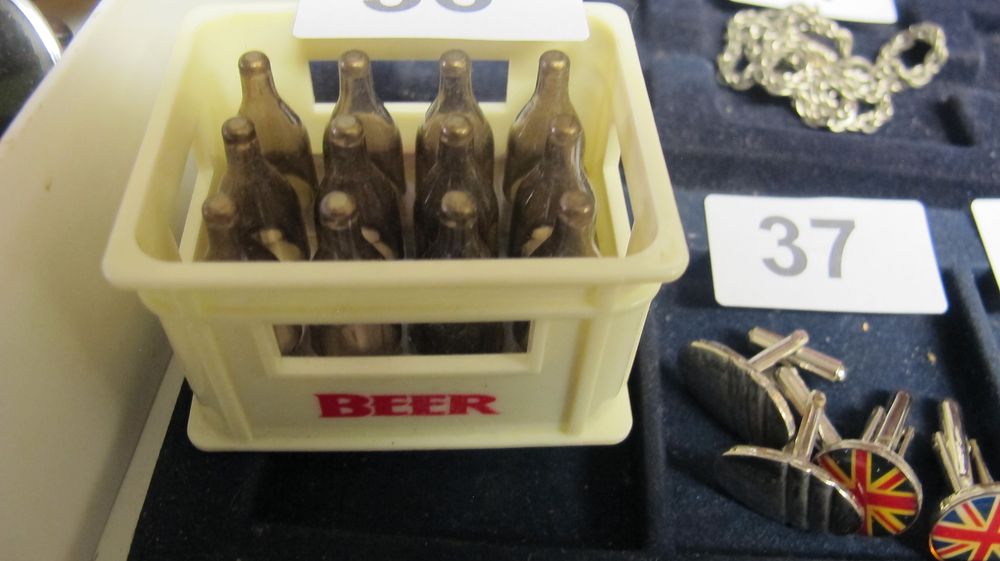 Lot 36: A Miniature Novelty Beer Crate with Twelve Glass Bottles
