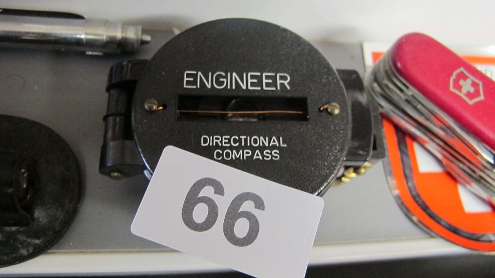 Lot 66: Engineer Directional Compass in a Metal Case