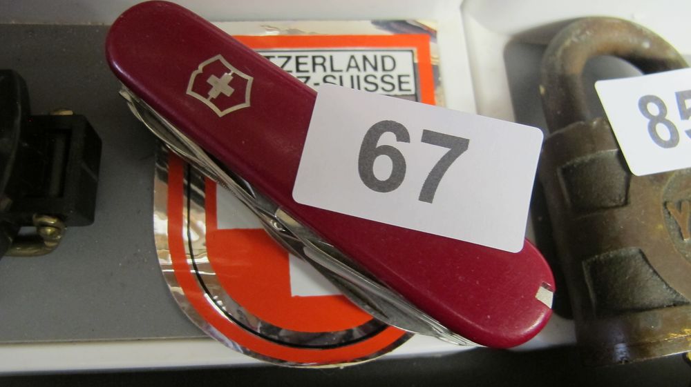 Lot 67: Victorinox Red Officer Suisse Multi-Tool Pocket Knife