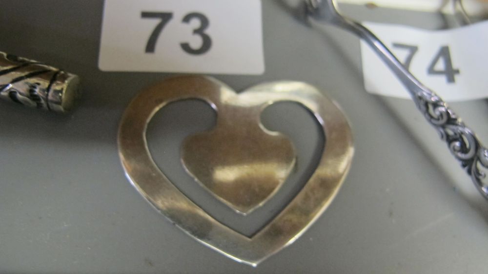 Lot 73: A Silver Heart-Shaped Page Clip Bookmark