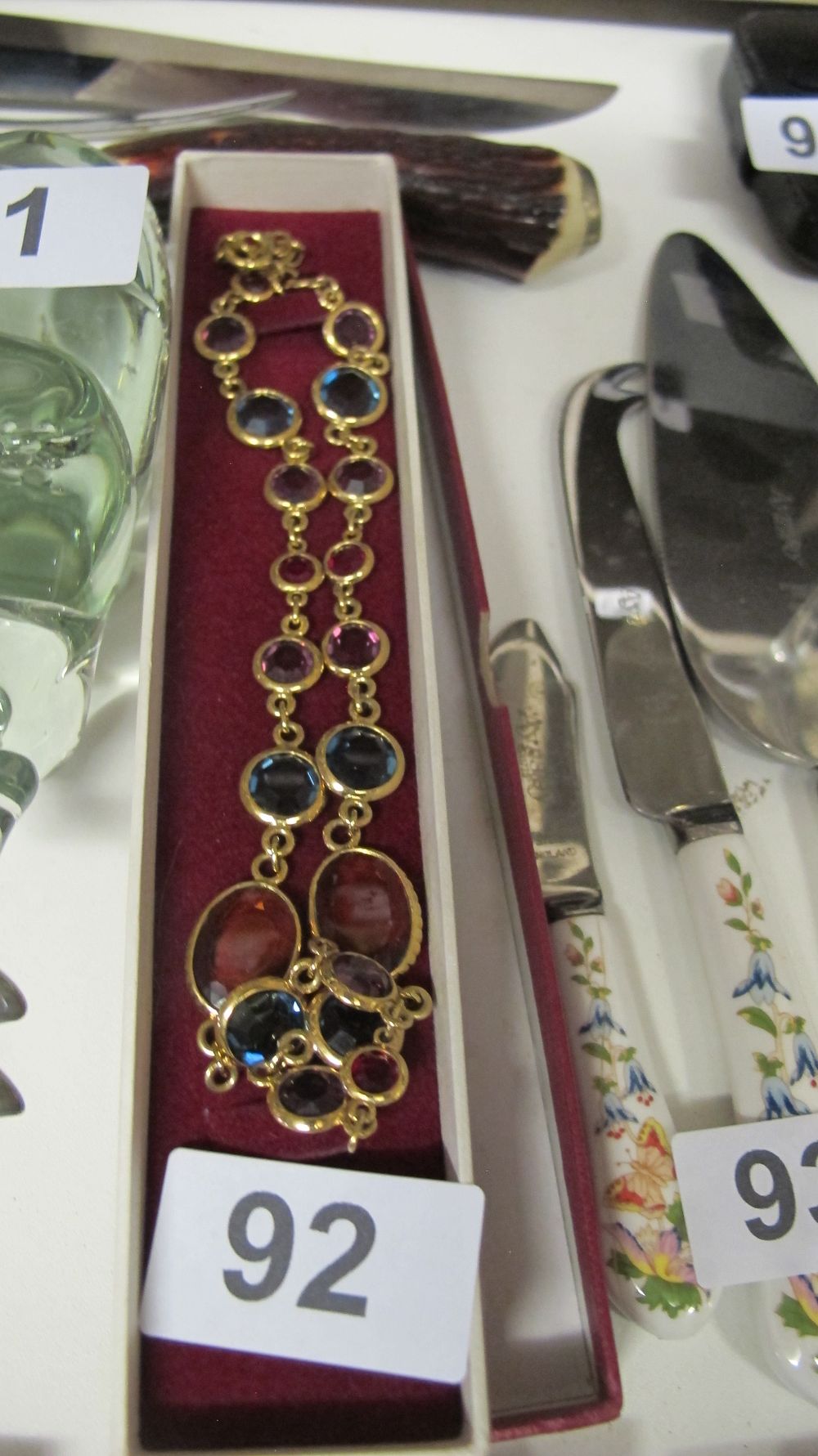 Lot 92: A Multi-Coloured Stone Set Yellow Metal Collar Necklace