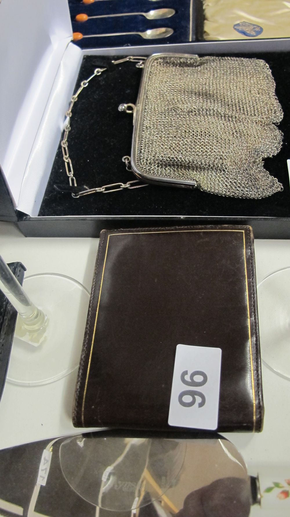 Lot 96: Two Personal Accessories Including a Bi-fold Leather Wallet and a Metal Mesh Evening Purse