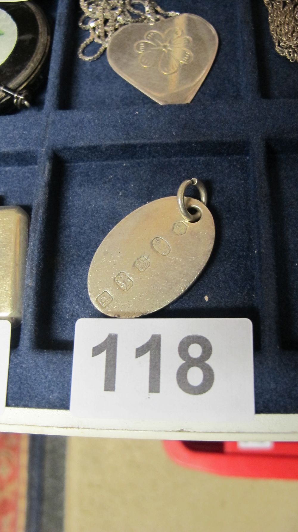 Lot 118: A Sterling Silver Oval Pendant by R and W Birmingham 1977