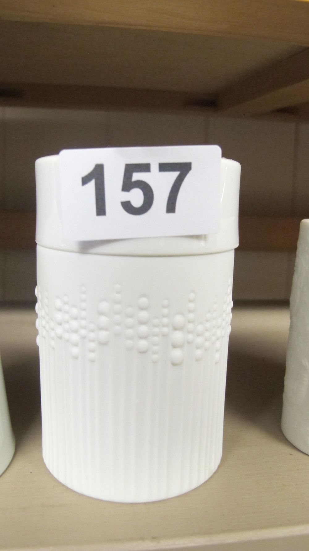 Lot 157: A White Unglazed Porcelain Cylindrical Vessel with Textured Relief