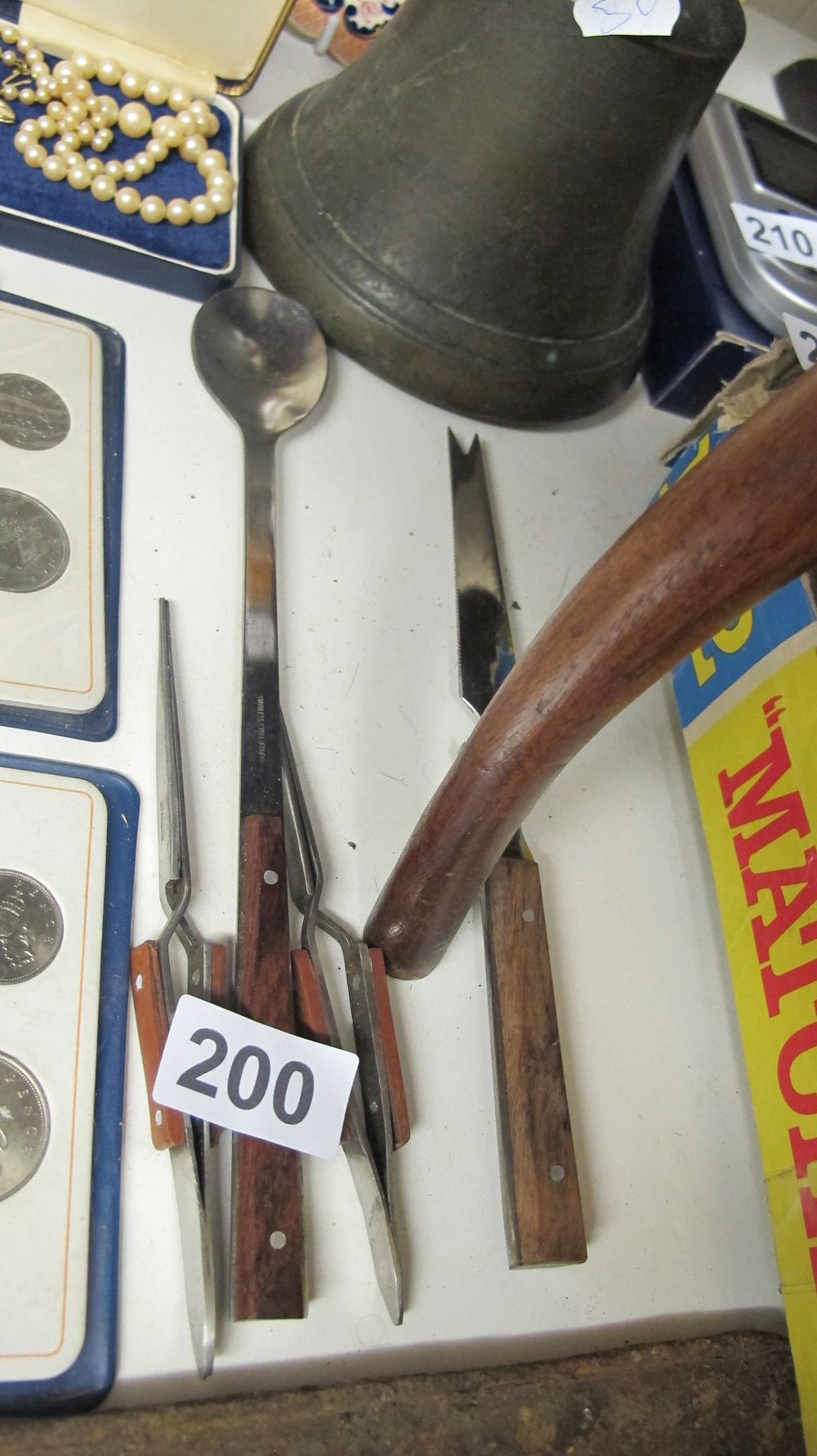 Lot 200: A Group of Vintage Stainless Steel and Wood Barware and Kitchen Utensils with Numismatic Items and a Bronze Vessel