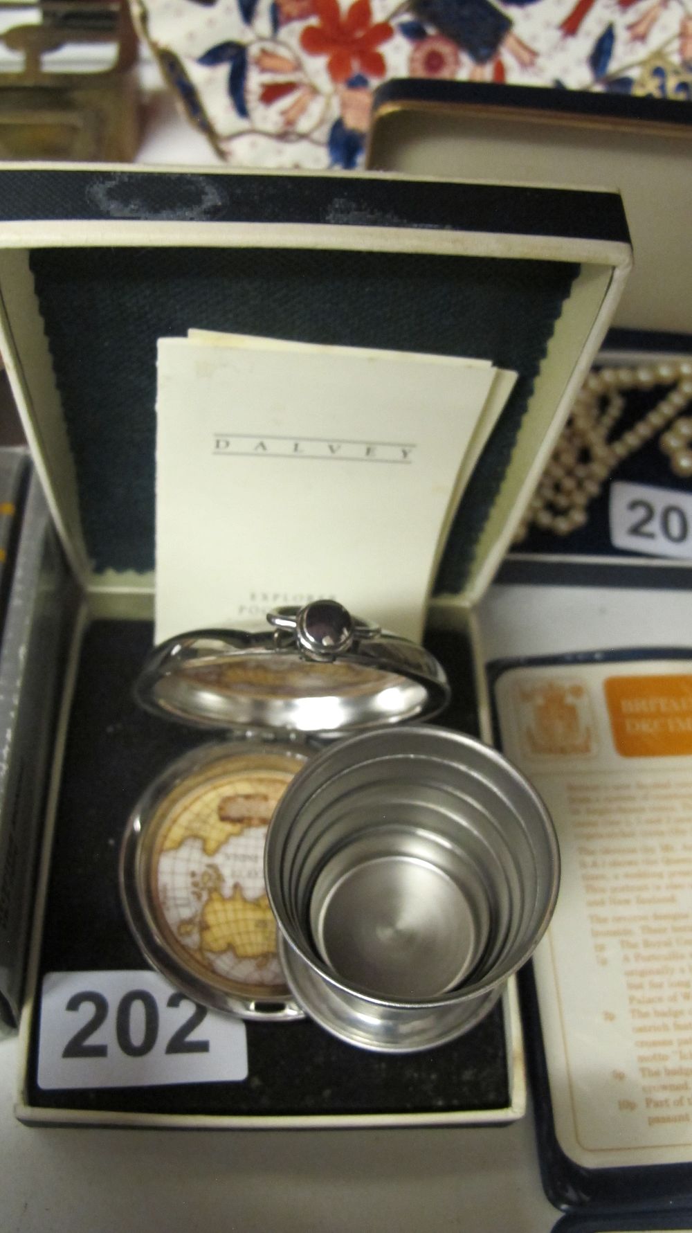 Lot 202: A Dalvey Explorer Stainless Steel Collapsible Drinking Cup and Compass Set