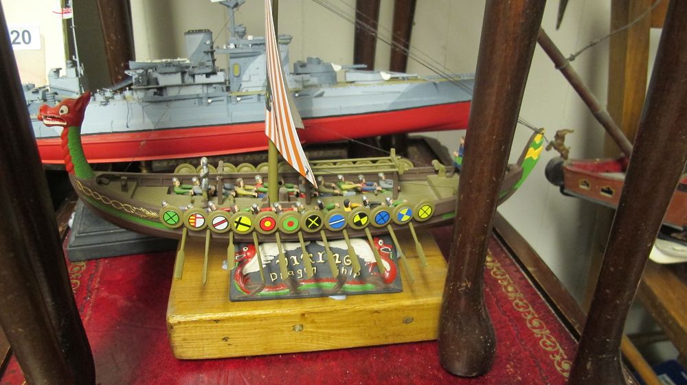 Lot 242: A Collection of Model Ships Including a Viking Dragon Ship and Naval Warship