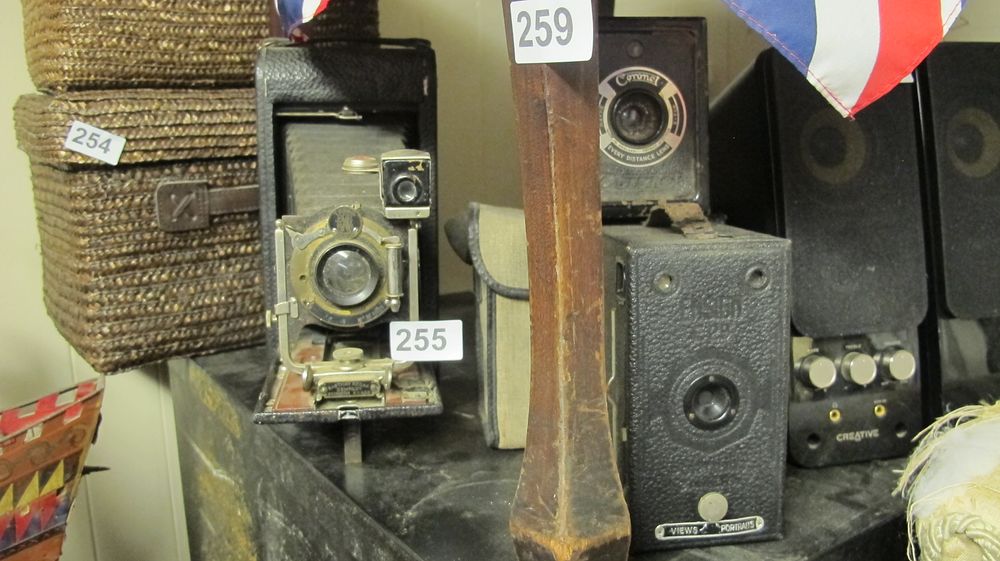 Lot 255: An Assortment of Vintage Cameras and Audio Equipment