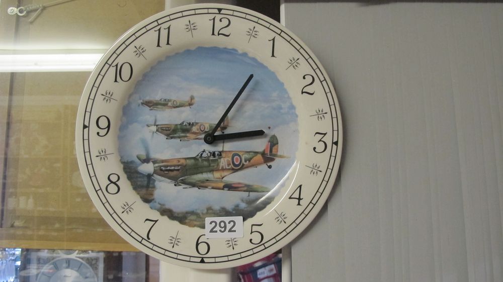 Lot 292: Ceramic Plate Wall Clock Featuring Supermarine Spitfire Aircraft