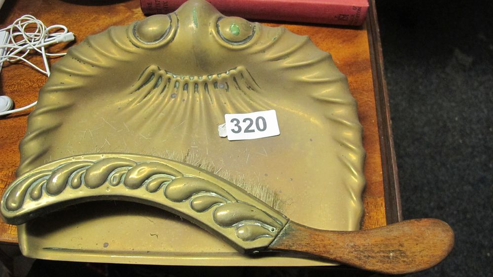 Lot 320: An Art Nouveau Brass Crumb Tray and Matching Brush Set
