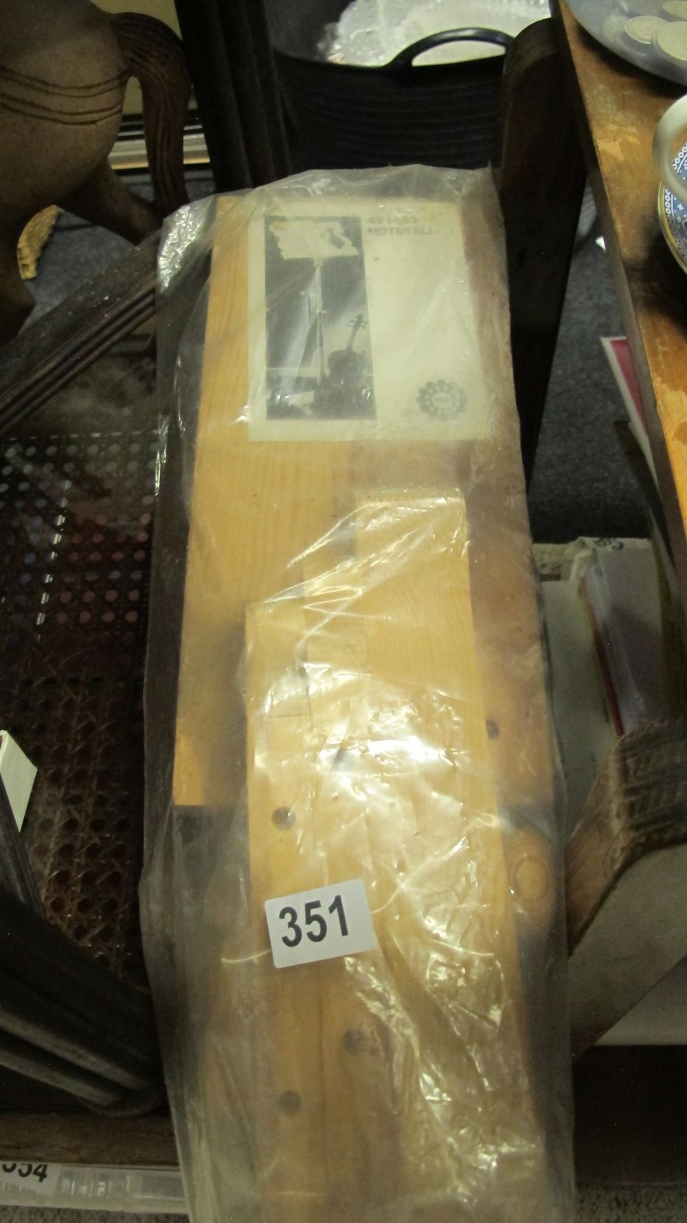 Lot 351: A Disassembled Wooden Music Stand in Original Packaging