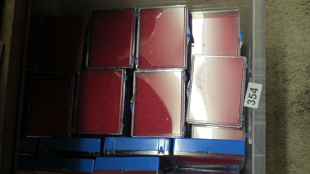 Lot 354: A Collection of Plastic Presentation Display Cases with Flocked Inserts