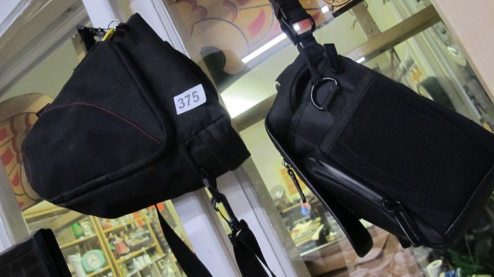 Lot 375: Two Black Synthetic Fabric Camera and Utility Bags