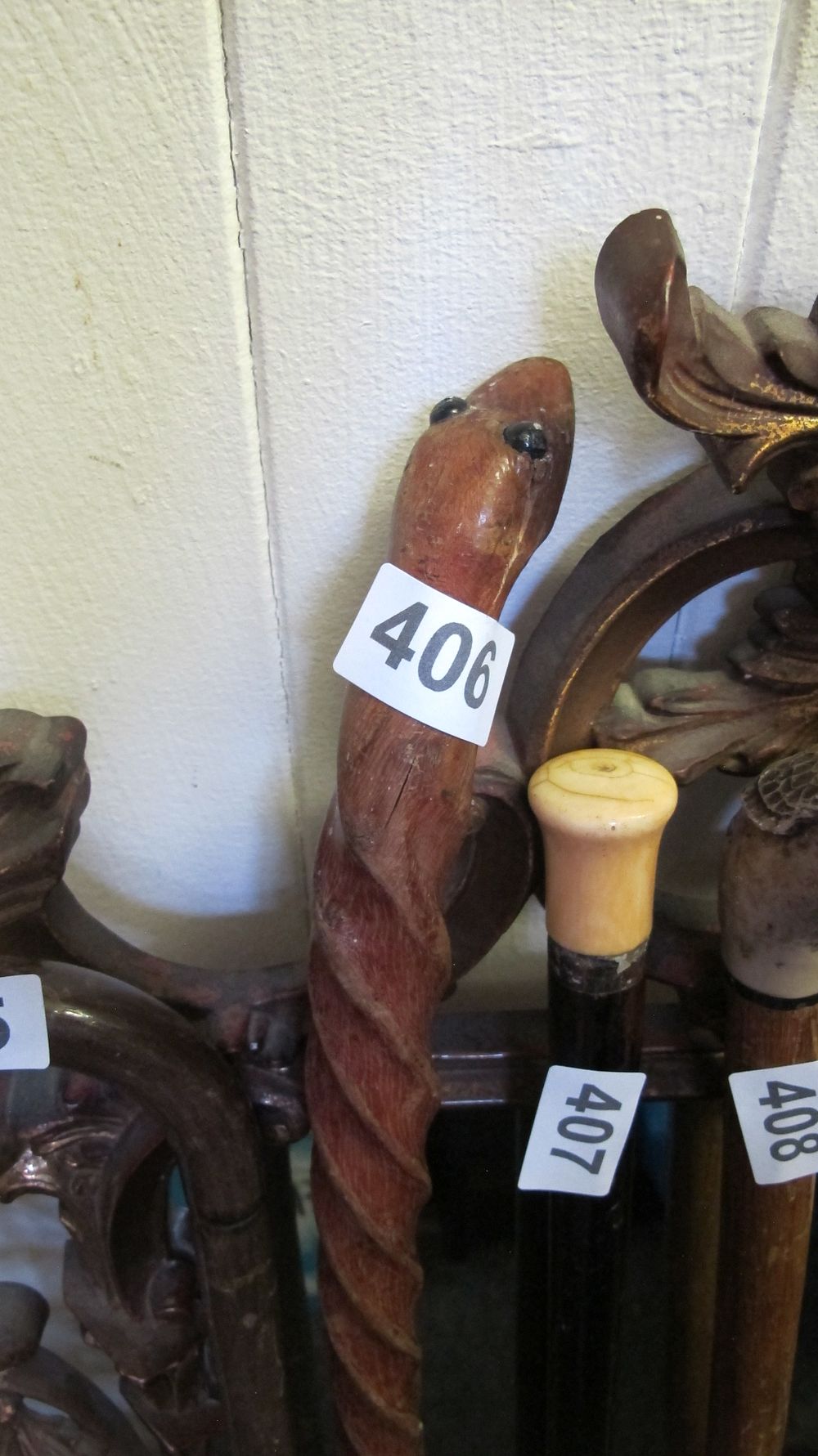 Lot 406: A Trio of Walking Sticks Including Carved Snake and Turned Knob Examples