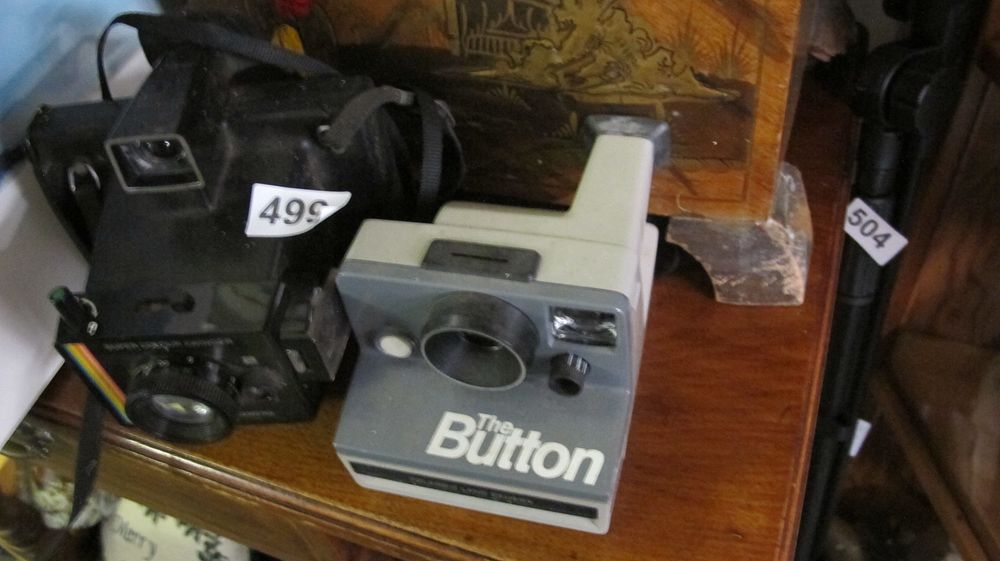 Lot 499: Two Polaroid Instant Film Land Cameras