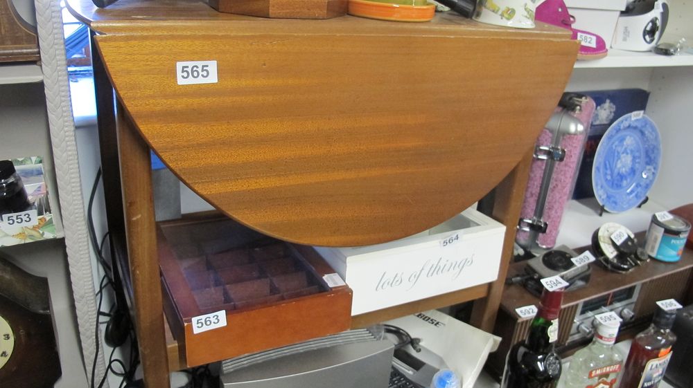 Lot 565: Mid-20th Century Teak Drop-Leaf Table