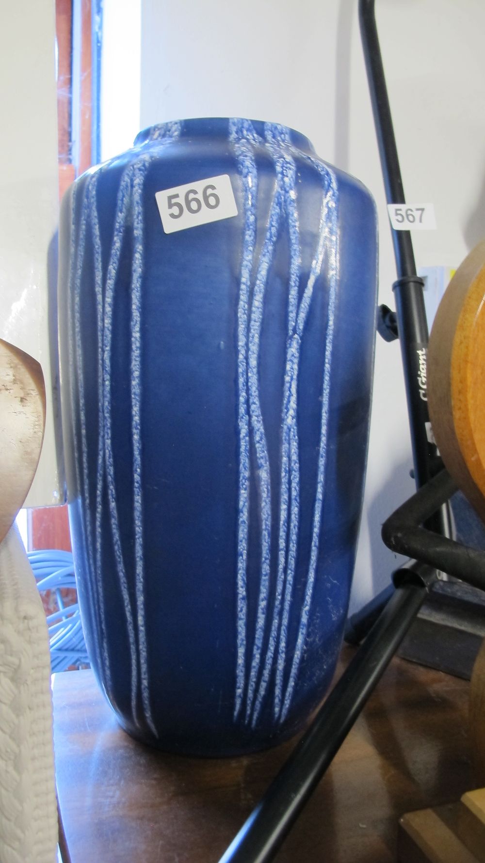 Lot 566: Mid-Century Blue Glazed Ceramic Vase with Textured Linear Decoration