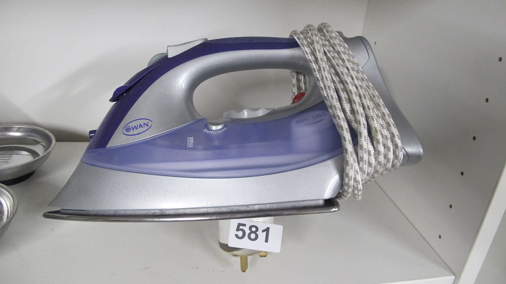 Lot 581: Swan Electric Steam Iron with Stainless Steel Soleplate