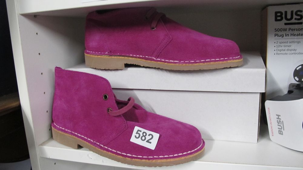 Lot 582: A Pair of Magenta Suede Desert Boots