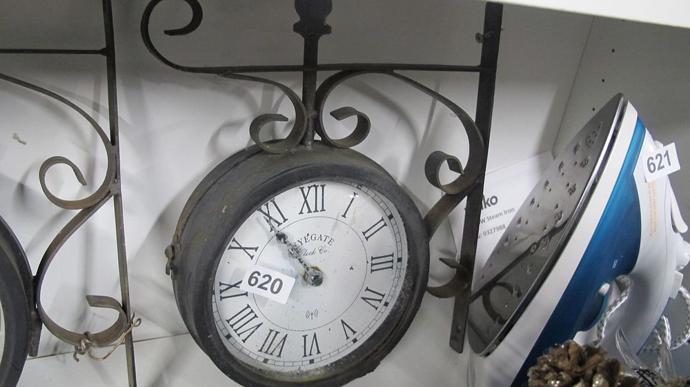 Lot 620: Metal Double-Sided Bracket Station Wall Clock