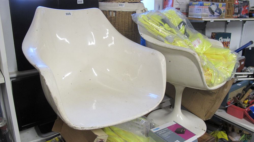Lot 668: A Pair of Mid-Century Modern Swivel Armchair Shells