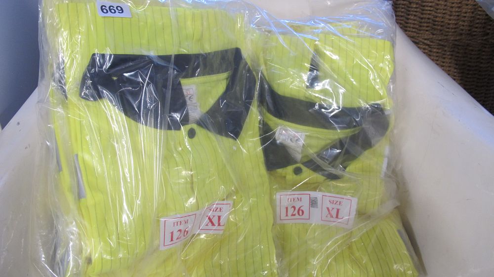 Lot 669: A Group of High-Visibility Polo Work Shirts Size XL