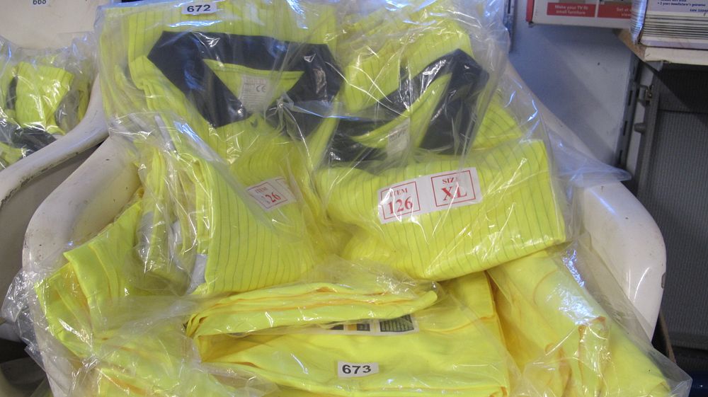 Lot 672: A Collection of High Visibility Short Sleeved Polo Shirts in Fluorescent Yellow