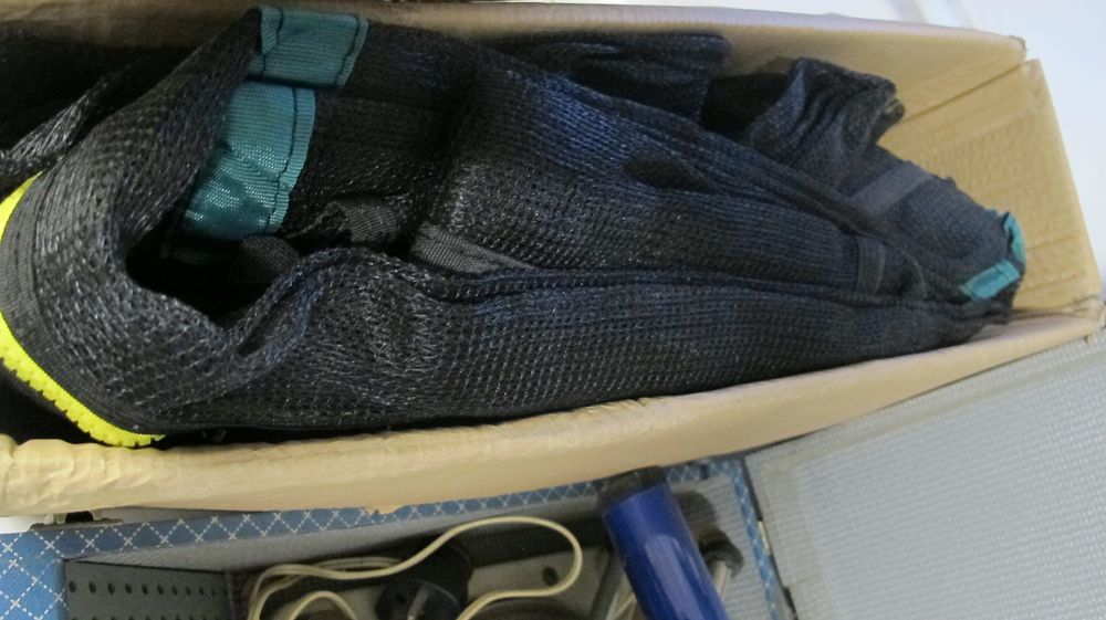 Lot 674: A Group of Textiles and Electrical Components Including a Synthetic Mesh Garment