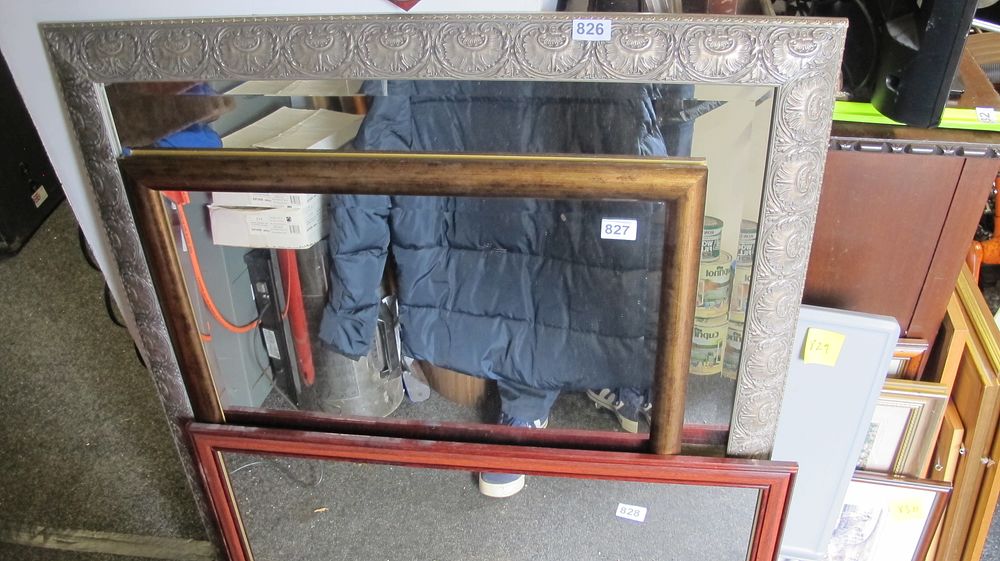 Lot 826: A Rectangular Bevelled Wall Mirror in an Embossed Metallic Foil Frame