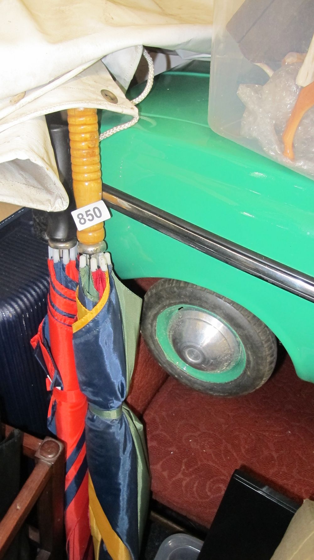 Lot 850: Two Umbrellas and a Vintage AMF Skylark Pedal Car Body Component