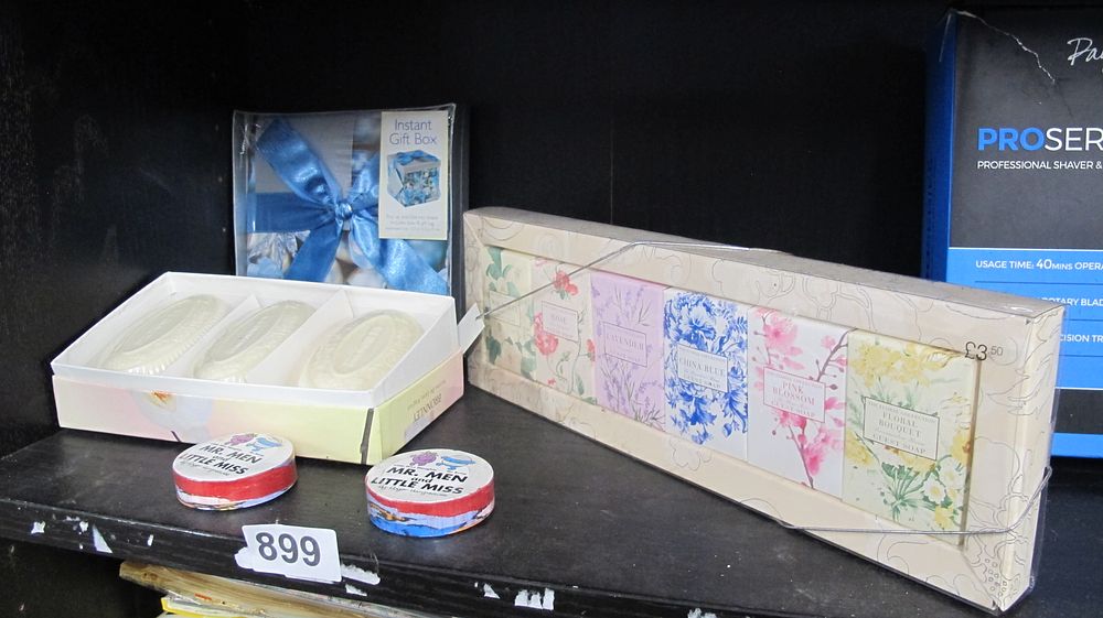 Lot 899: An Assortment of Boxed Guest Soap Gift Sets and Character Soaps