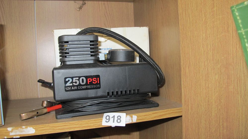 Lot 918: Portable 12V 250 PSI Air Compressor with Analog Gauge and Battery Clips