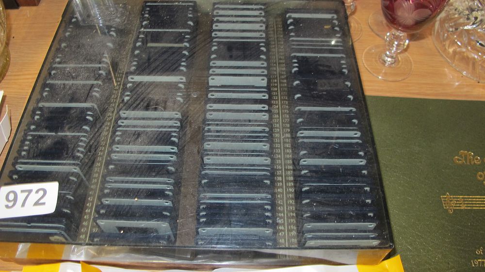 Lot 972: A Collection of Vintage Microscope Slides in a Tiered Acrylic Storage Case