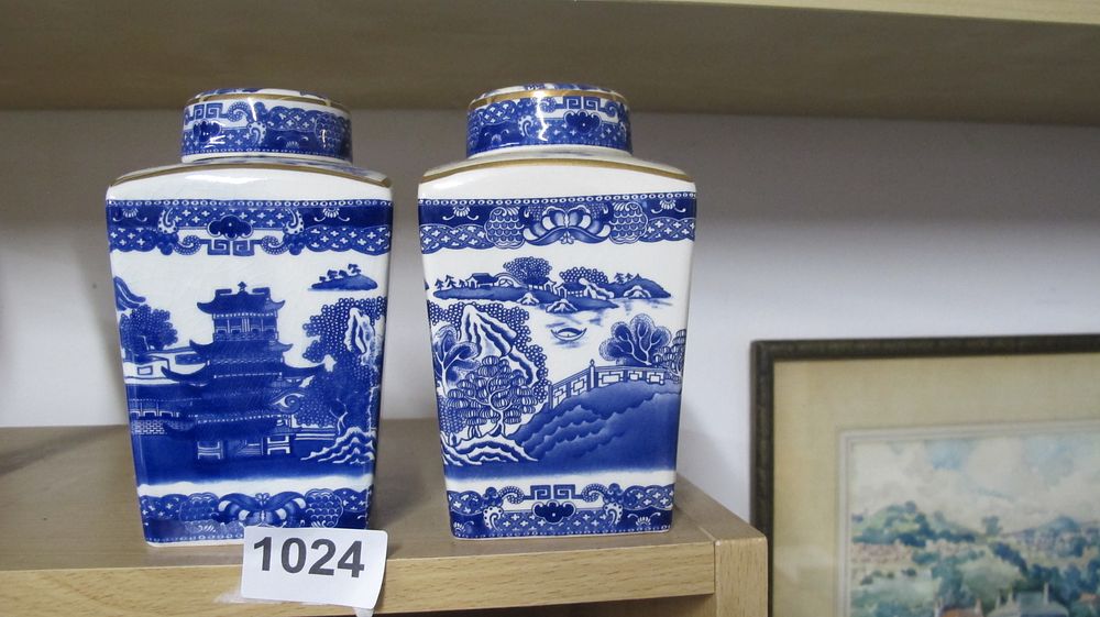 Lot 1024: A Pair of Blue Willow Pattern Rectangular Porcelain Tea Caddies