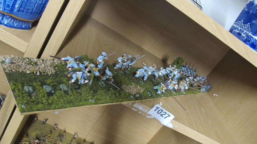 Lot 1027: A Collection of Hand Painted Miniature Military Figures on a Scenic Terrain Base