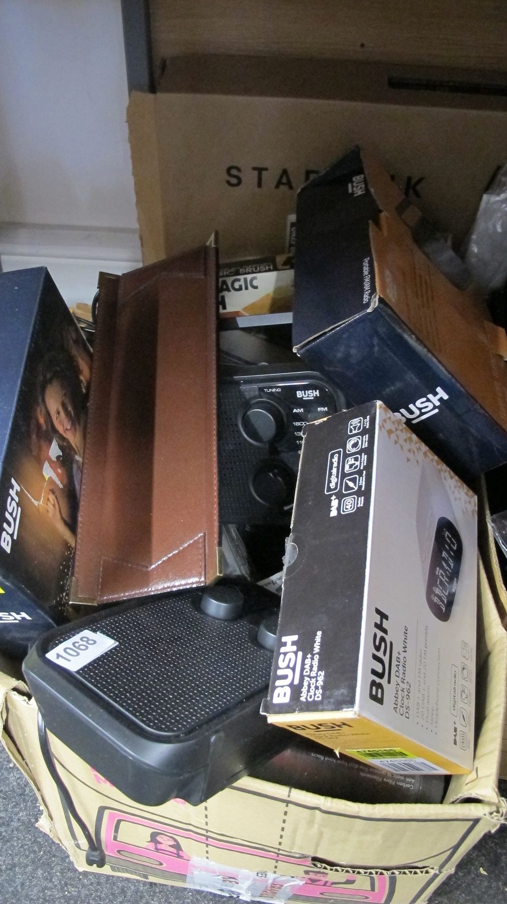 Lot 1068: A Collection of Bush Abbey DAB+ Clock Radios and Portable Audio Equipment