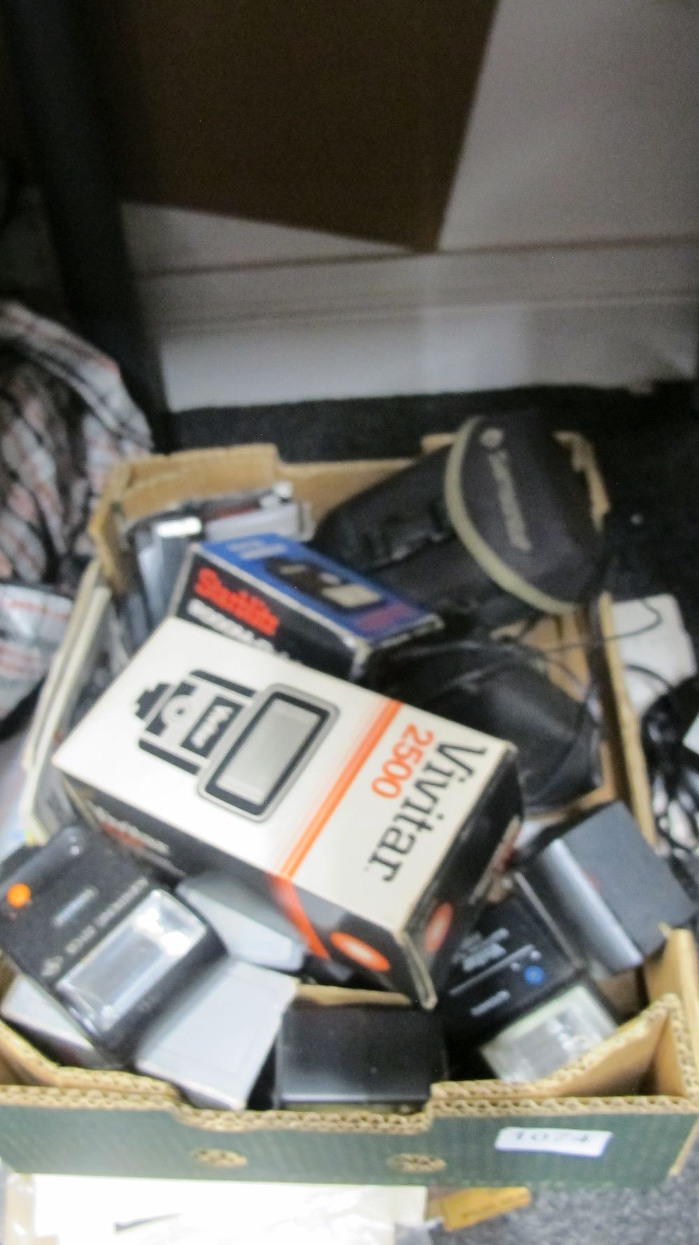 Lot 1074: A Collection of Vintage Camera Flash Units and Accessories Including Vivitar and Sunpak