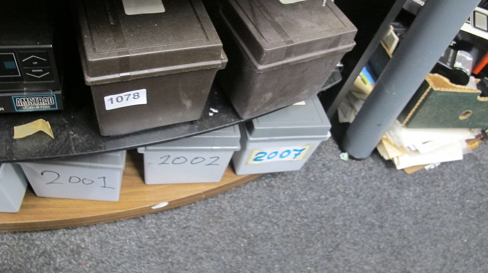 Lot 1078: An Amstrad VCR-4700 and a Collection of Plastic Storage Cases