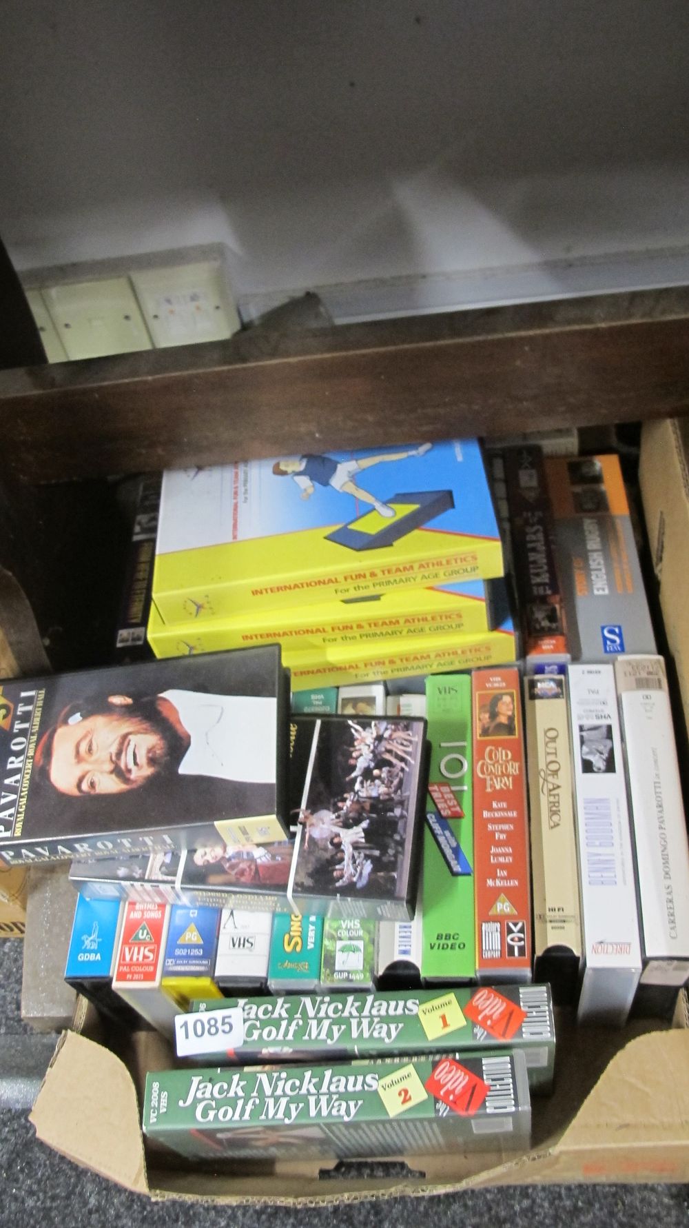 Lot 1085: A Collection of Approximately 25 VHS Video Cassettes Featuring Music and Sport