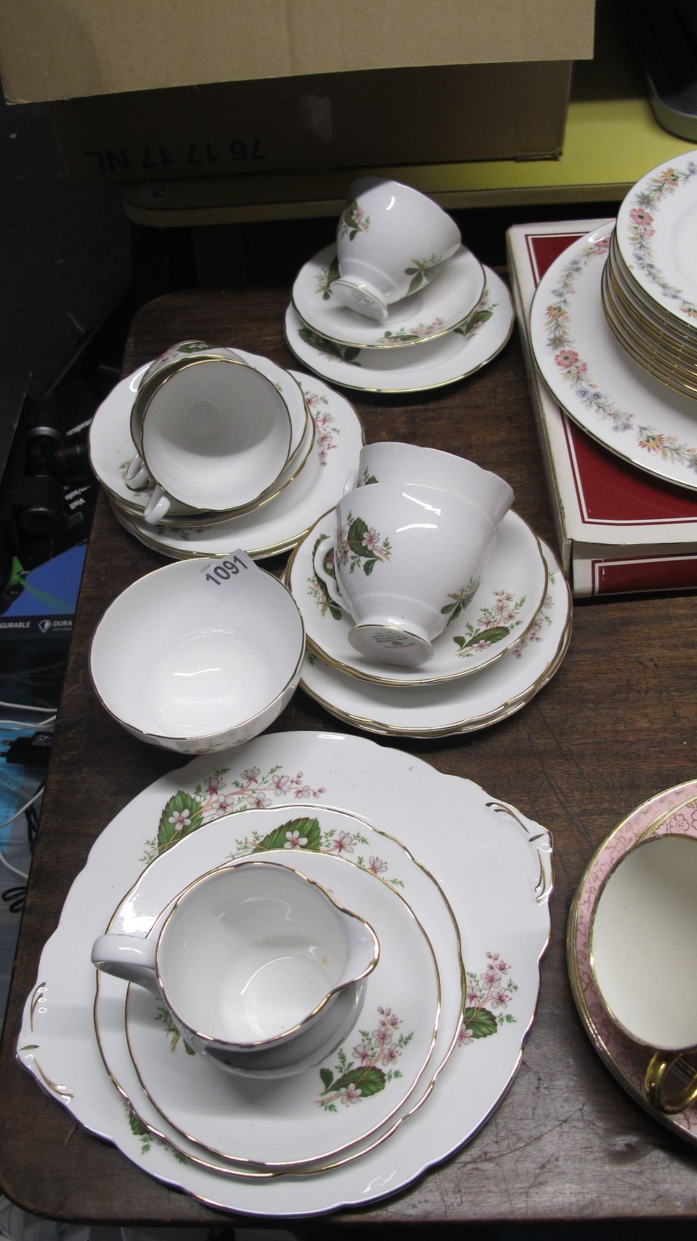 Lot 1091: A Collection of Bone China Tableware in Various Floral Patterns