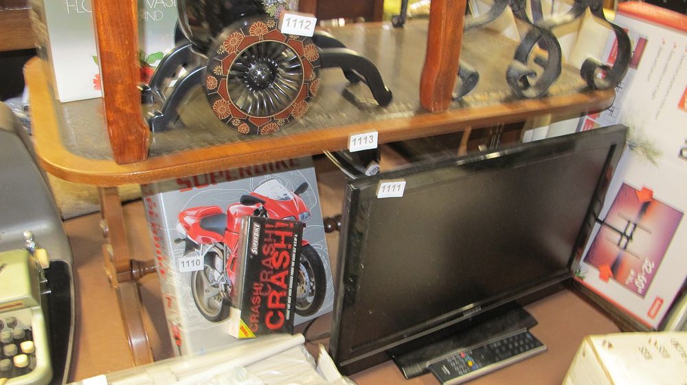 Lot 1113: A Two Tier Mahogany Stained Wood Side Table with a Group of Mixed Media and Electronics