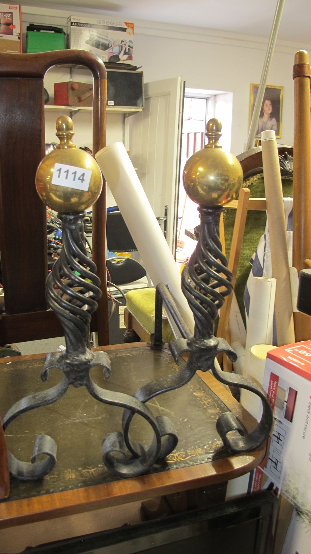Lot 1114: A Pair of Wrought Iron and Brass Fireplace Andirons