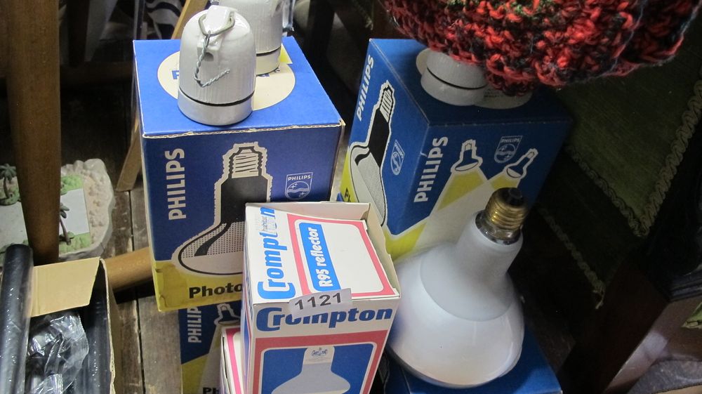 Lot 1121: An Assortment of Vintage Philips and Crompton Reflector Light Bulbs and Ceramic Lamp Holders