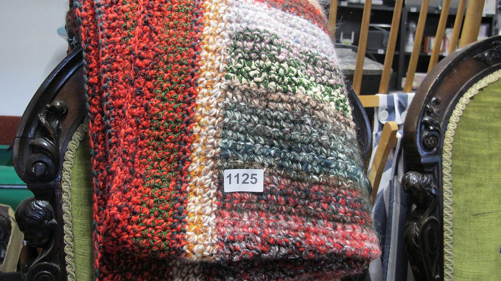 Lot 1125: A Multi-Coloured Hand-Crocheted Wool Blend Throw
